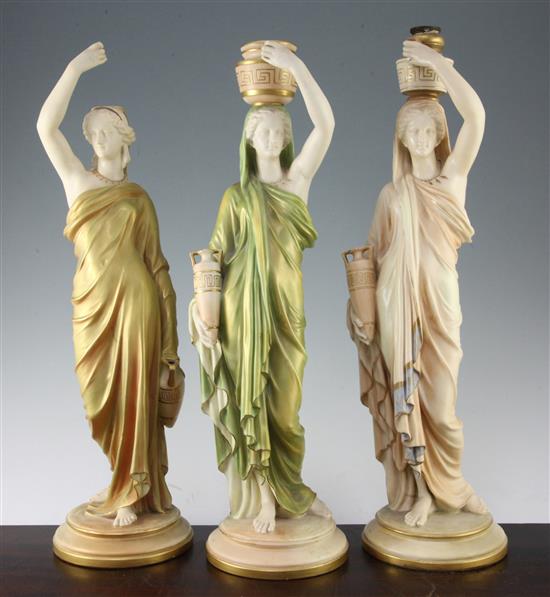 Three Royal Worcester figural lamp bases, late 19th / early 20th century, 51cm, one sconce damaged